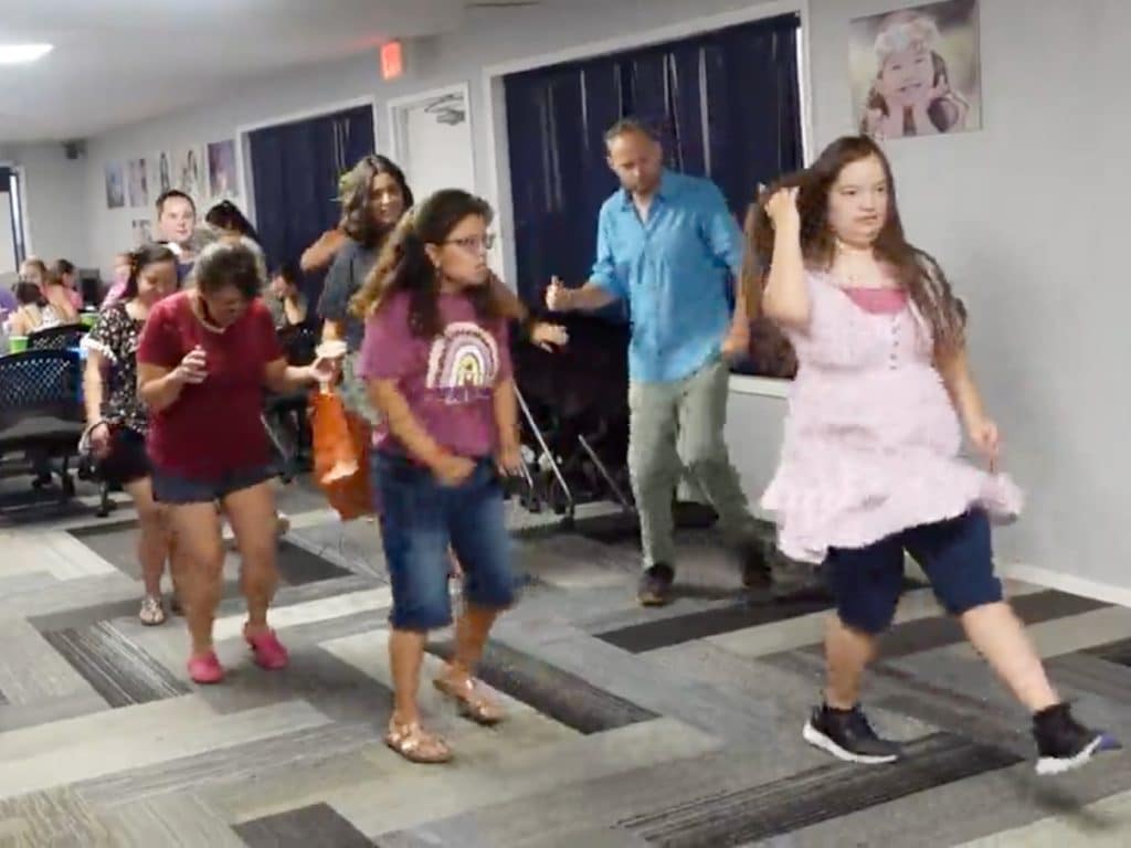 adults with Down syndrome doing zumba